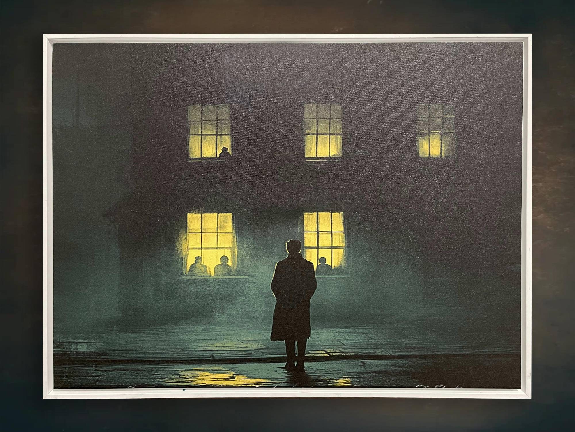 A lone figure in a long coat on a wet street at night, facing a building with glowing windows and silhouettes within.